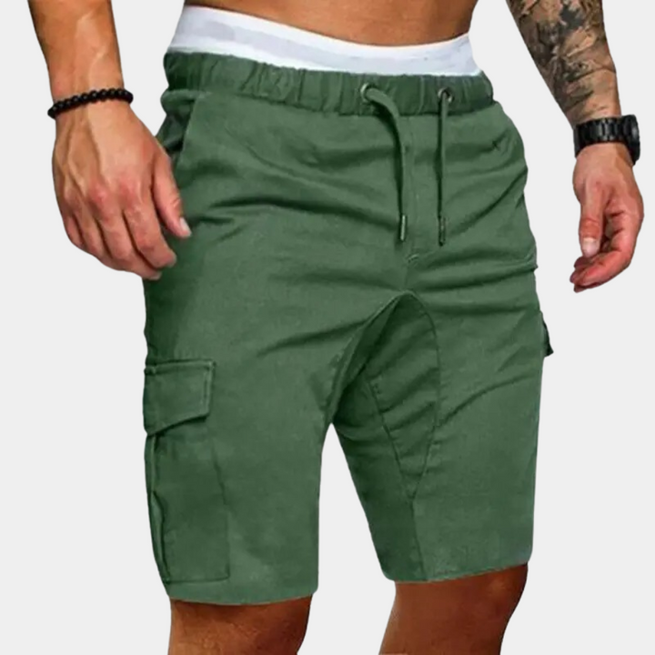 Groene cargo herenshorts met elastische tailleband en trekkoord, zijzakken, comfortabele pasvorm. Ideaal voor casual zomeroutfits.